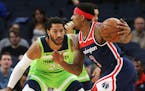 Derrick Rose (guarding Washington guard Bradley Beal) extended his playing time to 30 minutes -- and scored 29 points, including a clutch basketball i