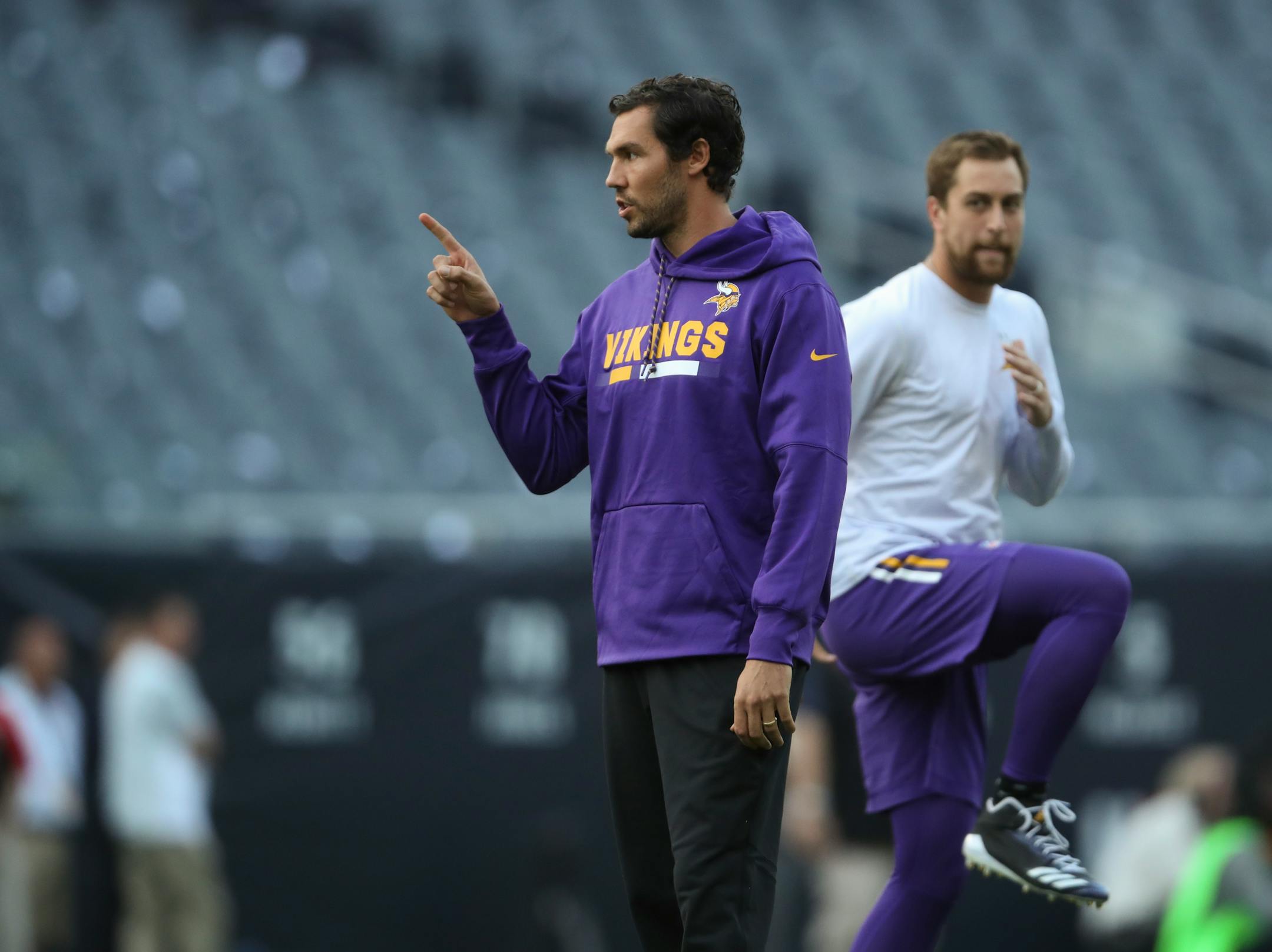 Minnesota Vikings quarterback Sam Bradford was on the field throwing during early warmups Monday evening in Chicago. Wide receiver Adam Thielen warmed up behind him.