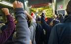 Black Lives Matter protesters made their way from the Mall of America to Terminal 2 of Minneapolis-St. Paul International Airport in December via ligh