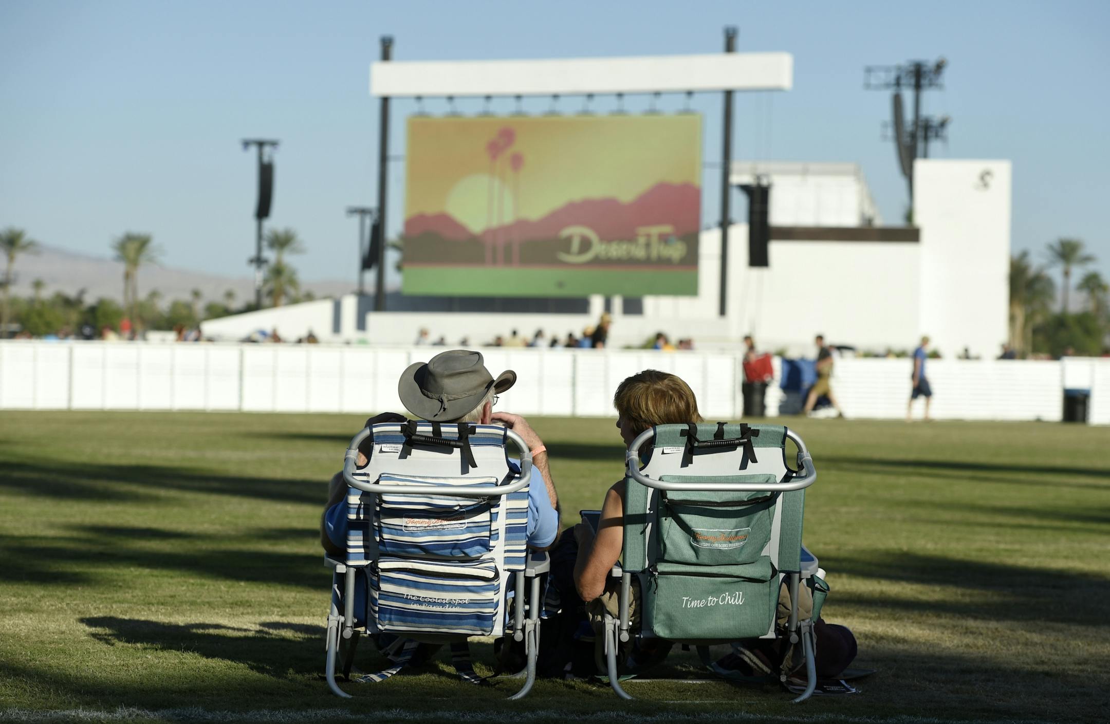 Festivalgoers rest in lawn chairs as they wait for performances to begin on day 2 of the 2016 Desert Trip music festival at Empire Polo Field on Saturday, Oct. 8, 2016, in Indio, Calif.
