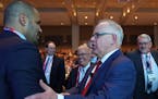 Gov. Tim Walz, an amiable executive shown here at a 2019 Minnesota Chamber of Commerce event, has made big, controversial proposals, but disagreed agr