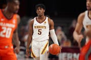 Minnesota guard Marcus Carr (5) surveyed the court for options in the second half. ] ANTHONY SOUFFLE • anthony.souffle@startribune.com