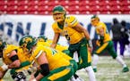 North Dakota State quarterback Trey Lance (5), who is from Marshall, Minn., yells instructions to his team during a game last season.