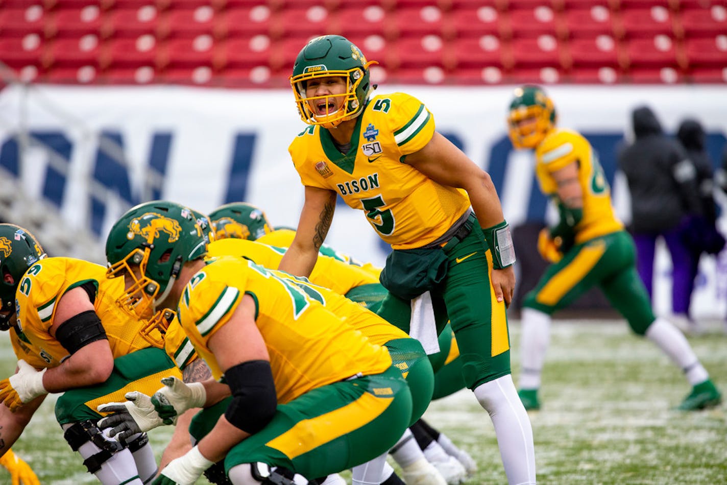 North Dakota State quarterback Trey Lance (5), who is from Marshall, Minn., yells instructions to his team during a game last season.