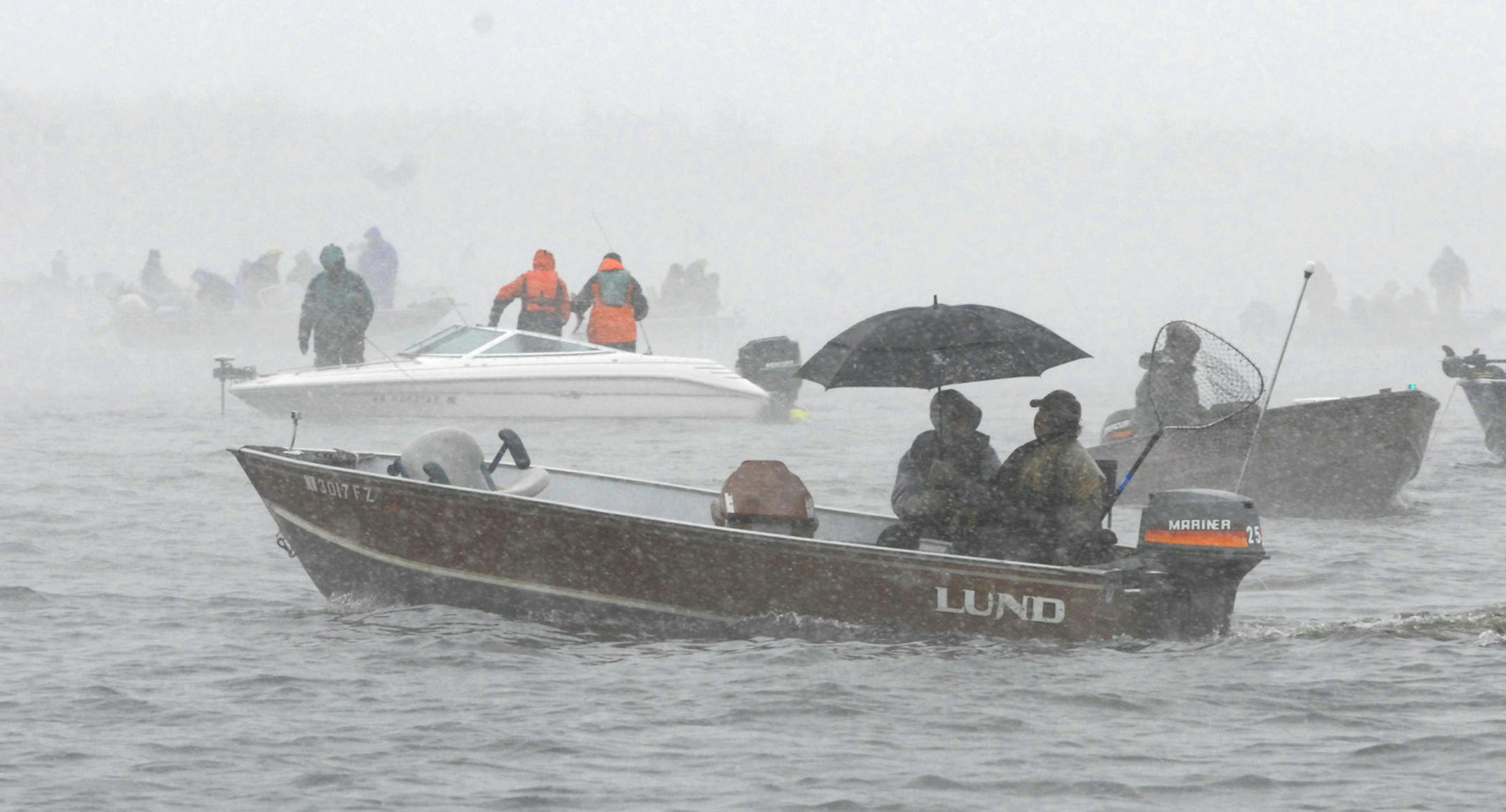 Snow in May? Yes, and plenty of it on the fishing opener Saturday for anglers on Upper Red Lake, about an hour's drive north of Bemidji. Anglers sought shelter however they could, including beneath umbrellas. Fishing was generally good.