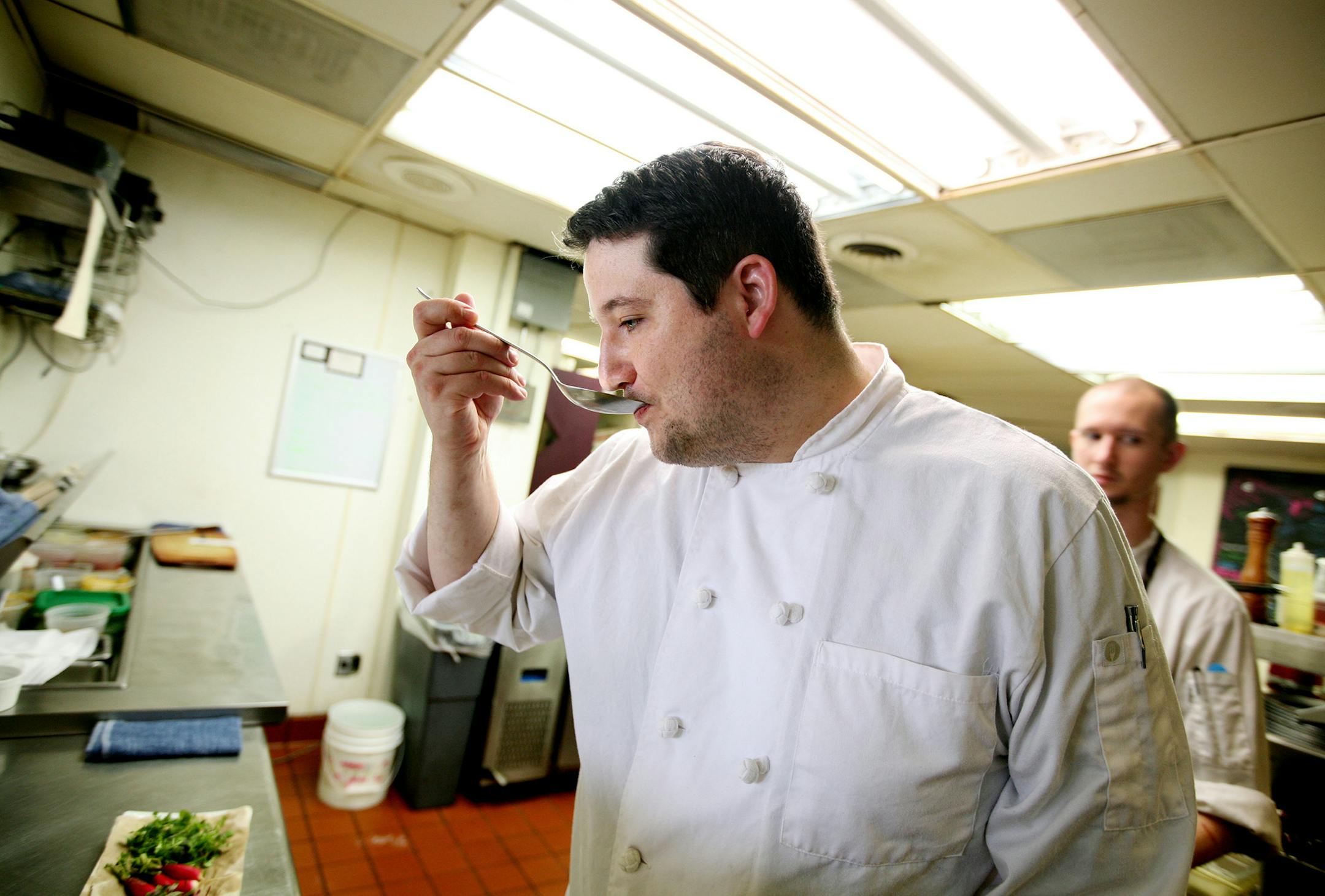 Chef Thomas Boemer prepares a spring dish at Corner Table in Minneapolis June 7, 2013. (Courtney Perry/Special to the Star Tribune)