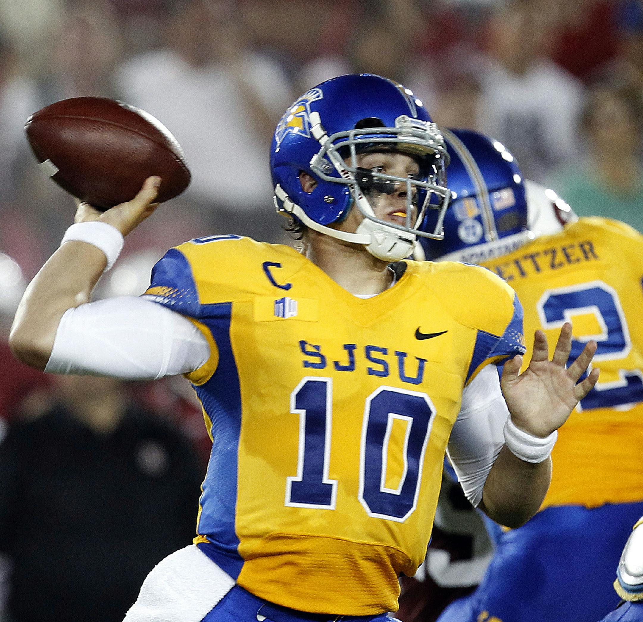 San Jose State quarterback David Fales (10) throws a pass against Stanford during the first half of an NCAA college football game in Stanford, Calif., Saturday, Sept. 7, 2013. (AP Photo/Tony Avelar)