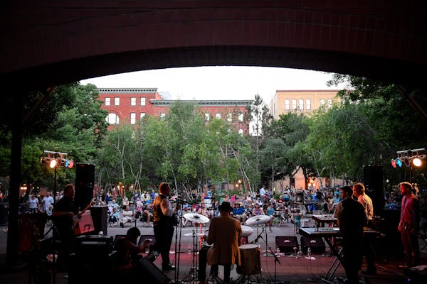 The band "3 Minute Hero" performed for a crowd of a few hundred during Friday night's live music in Mears Park. ] AARON LAVINSKY • aaron.lavinsky@st