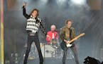 Mick Jagger, from left, Charlie Watts, and Keith Richards of The Rolling Stones performs during the "No Filter" tour at Soldier Field on Friday, June 