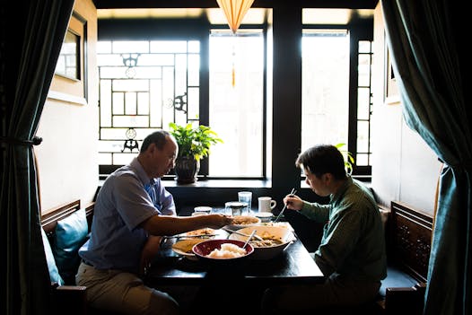 David Cheng of Minneapolis and Shawn Chen of St. Paul spiced things up at the Tea House recently with serrano pepper beef and spicy fish noodles.
