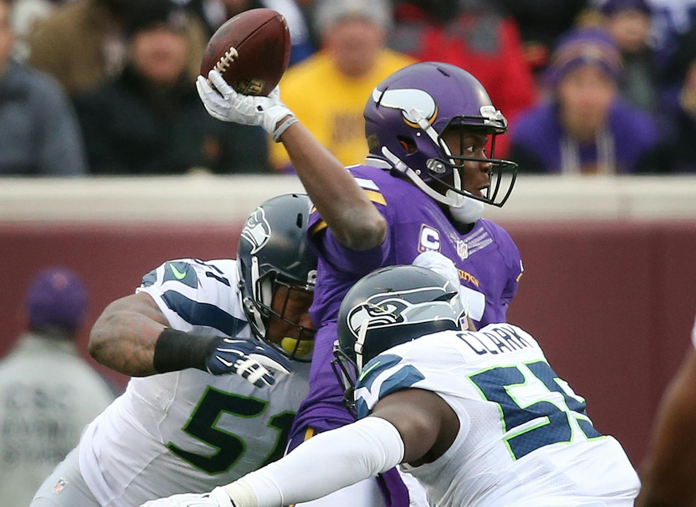 Minnesota Vikings quarterback Teddy Bridgewater (5) was pressured into throwing an incomplete pass by Seattle Seahawks outside linebacker Bruce Irvin (51) and defensive end Frank Clark (55) Sunday December 6, 2015 in Minneapolis, MN. ] The Minnesota Vikings hosted the Seattle Seahawks at TCF Bank Stadium. Jerry Holt/ Jerry.Holt@Startribune.com