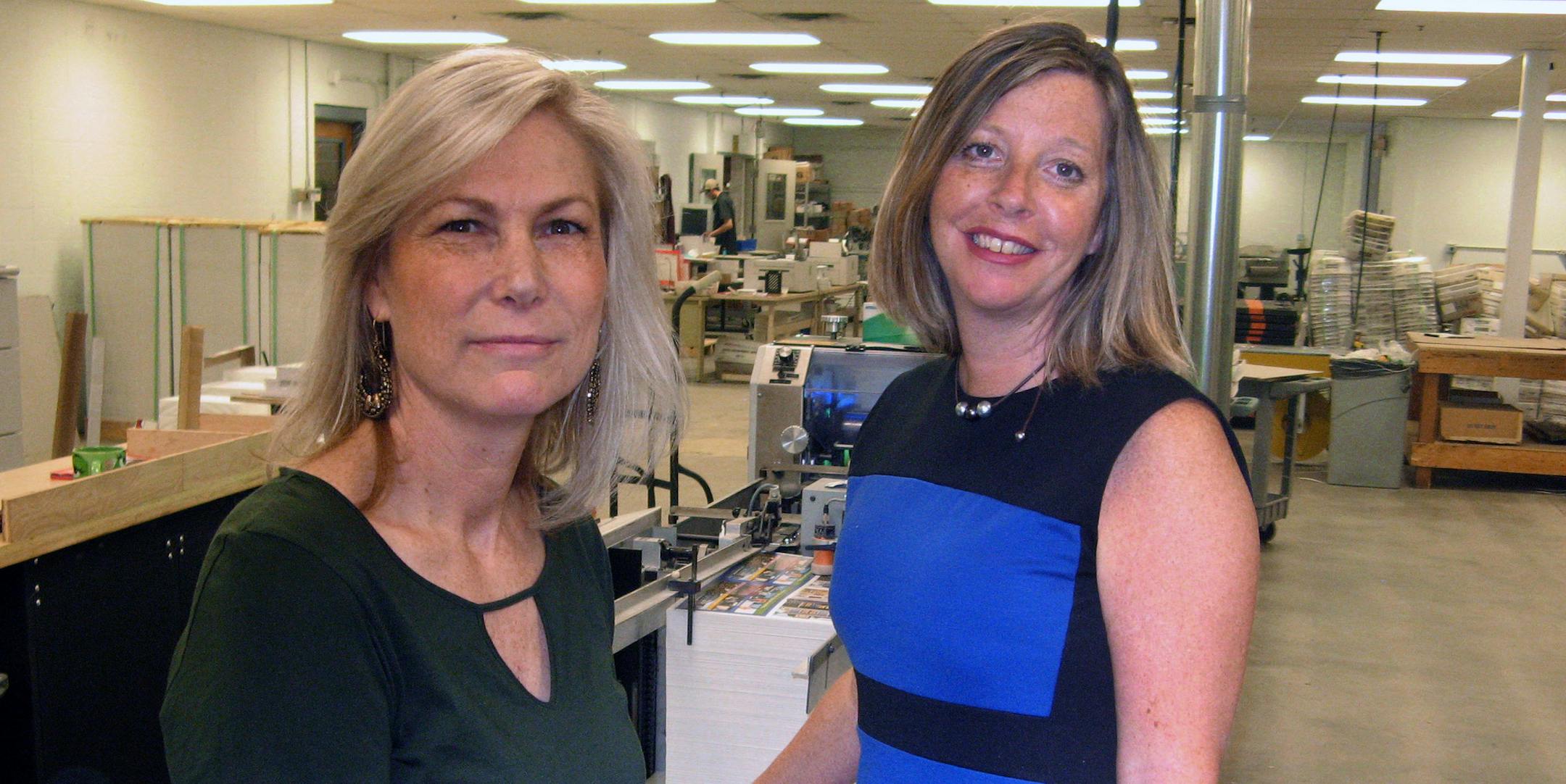 Mary Hamel, left, executive director of the Twin Cities Metro Business Alliance and Printz co-owner Stephanie Hansen.