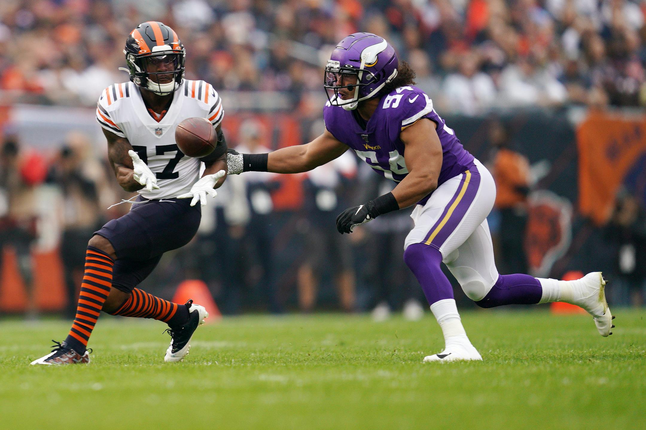 Bears wide receiver Anthony Miller completed a pass as Vikings middle linebacker Eric Kendricks went in for the tackle in the first quarter.