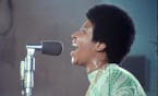 This image released by Neon shows Aretha Franklin in a scene from the film, "Amazing Grace." (Neon via AP)