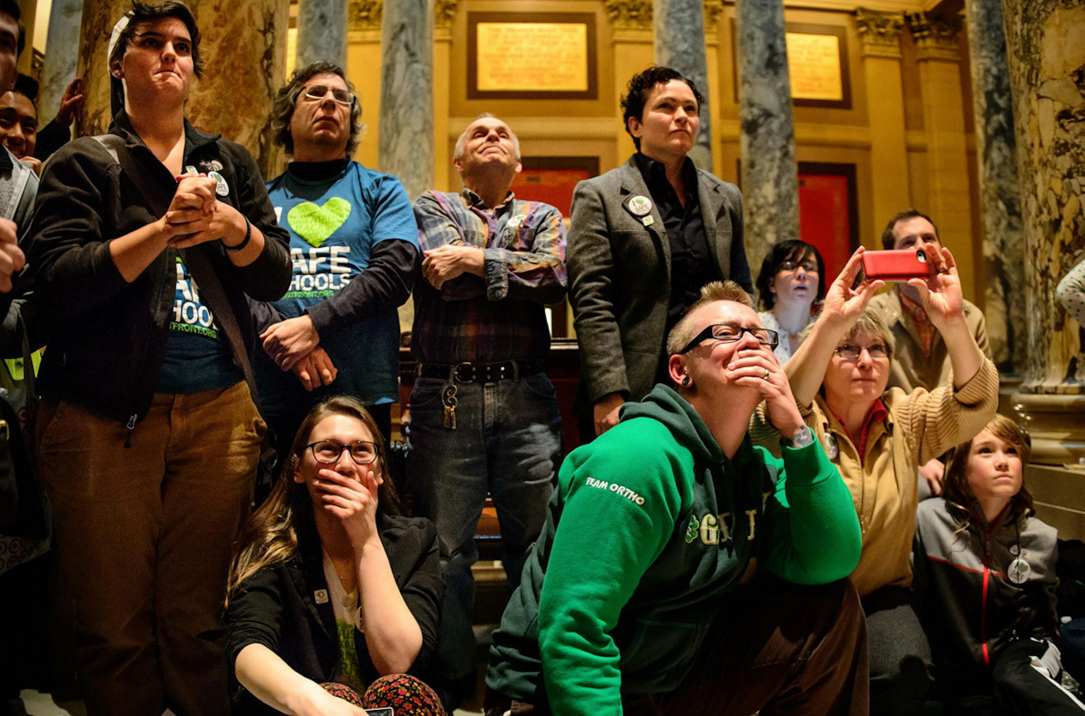 Members of Outfront Minnesota held their breath and prayed as the vote was taken on the anti-bullying bill and cheered as it passed 36-31. ] GLEN STUBBE * gstubbe@startribune.com Thursday, April 3, 2014.