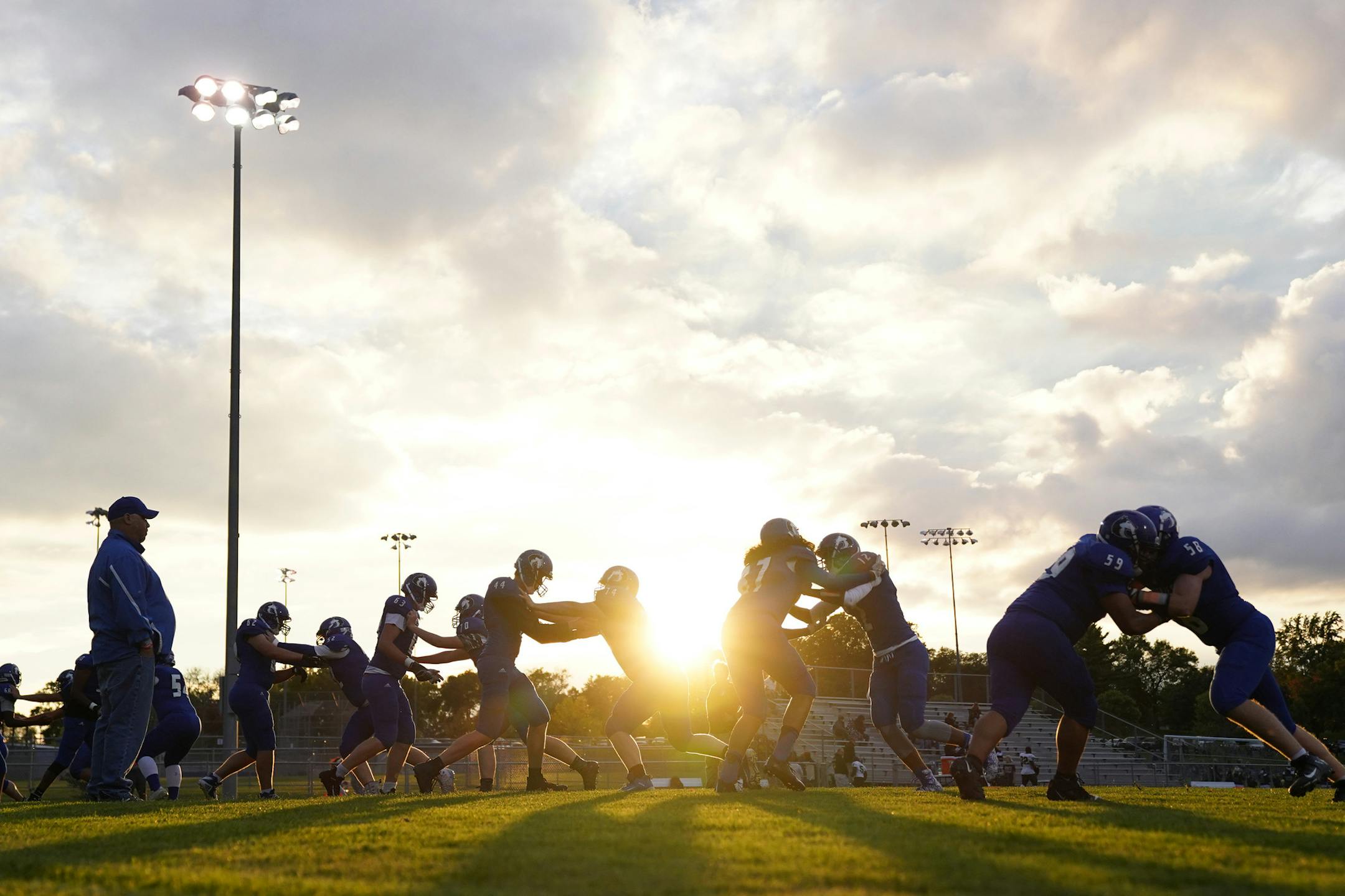 St. Anthony warmed up on the field prior to a game this season against Fridley.