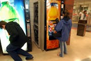 Given a choice between soda and juice students at Eden Praire High School seemed split about even between juice and soda.The machine on the left was t