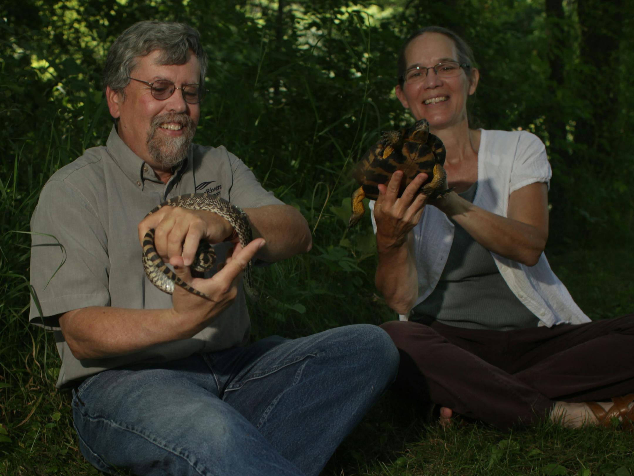 John J. Moriarty and Carol D. Hall sit for a portrait at French Regional Park on Thursday morning. The two are co-authors of the new book "Amphibians and Reptiles in Minnesota." ] MONICA HERNDON monica.herndon@startribune.com Plymouth, MN 07/24/14