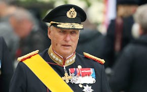 FILE - King Harald V of Norway leaves the Notre Dame cathedral after attending at the funeral of the Grand Duke Jean of Luxembourg, in Luxembourg, on
