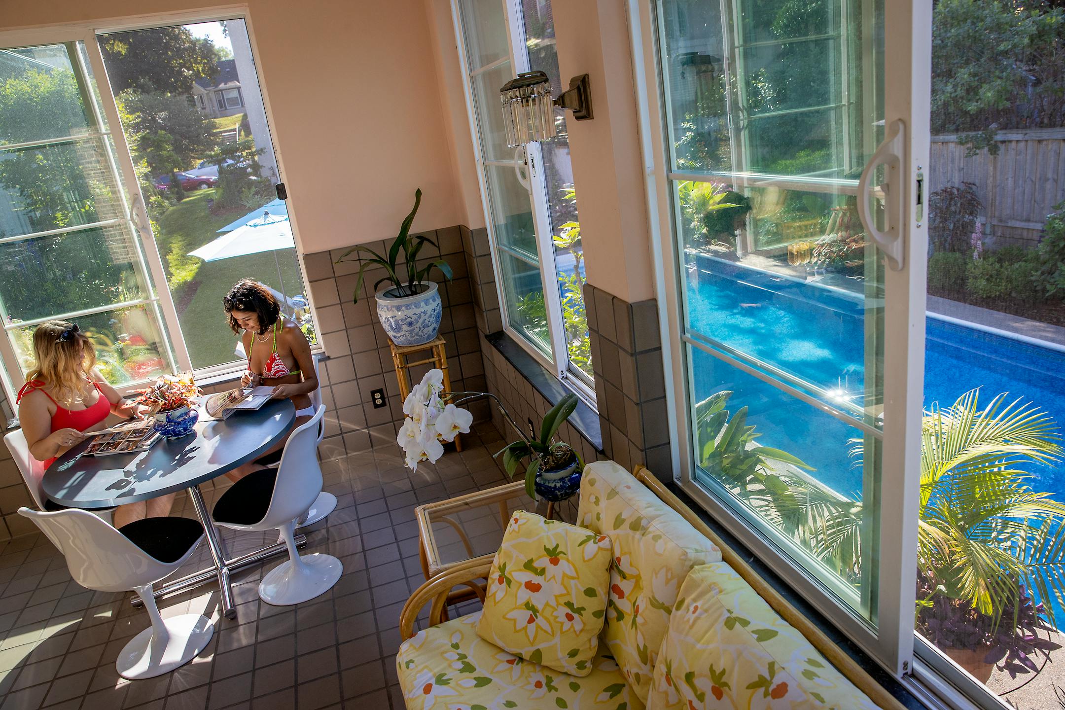 Valeria Martinez-Rojas, left, and Sloan Carden enjoyed a morning swim at the home of Sean Ryan and Ed Piechowski, Wednesday, June 30, 2021 in St. Paul, MN. ] ELIZABETH FLORES • liz.flores@startribune.com