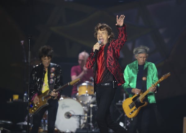 Mick Jagger and the Rolling Stones at TCF Bank Stadium Wednesday night. Ron Wood, Charlie Watts, and Keith Richards are from left.