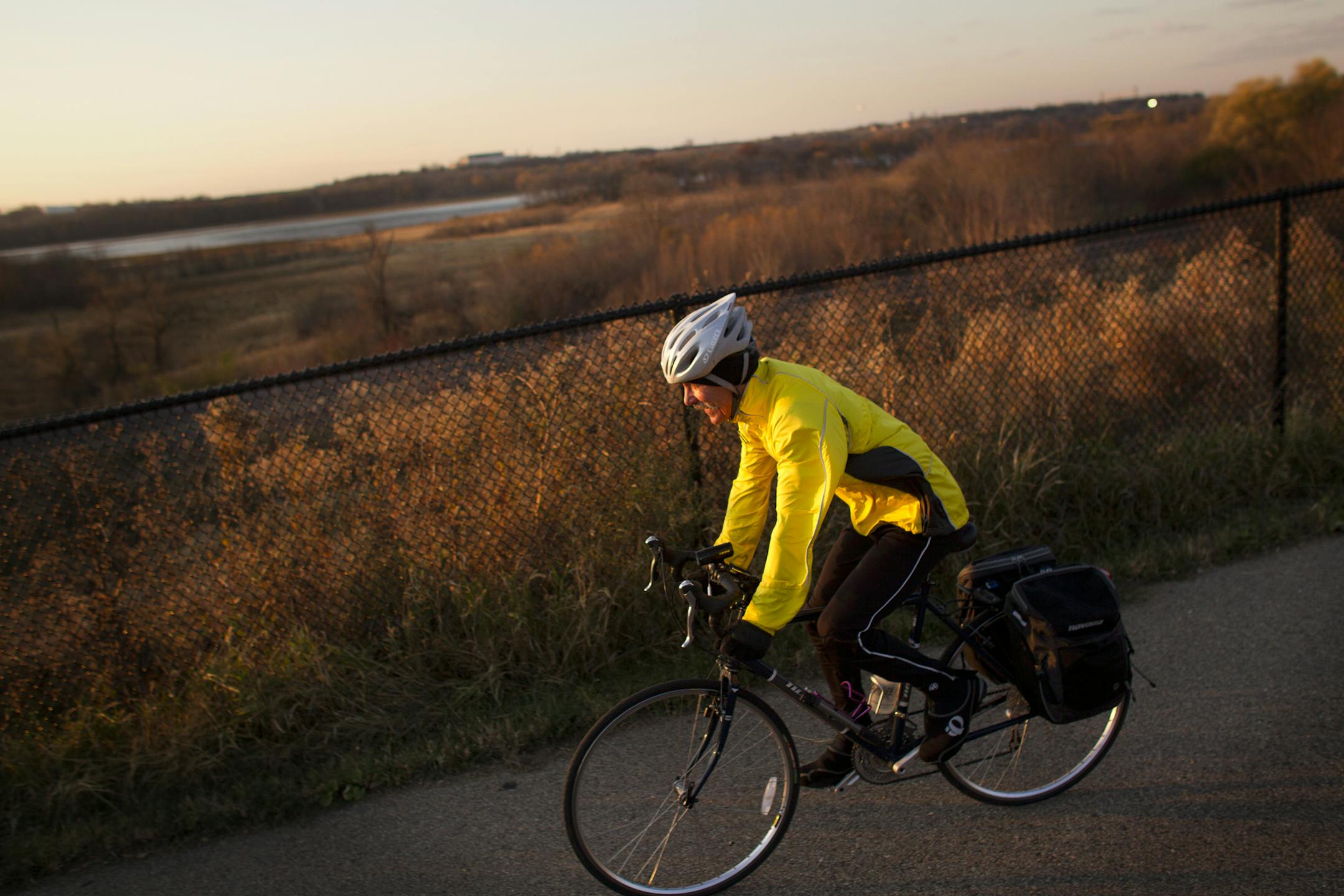An unidentified man sped past on his bicycle along the Minnesota River Valley on the Big Rivers Regional Trail, Wednesday, November 9, 2011 in Mendota Heights, Minn. ] (RENEE JONES SCHNEIDER/ reneejones@startribune.com)
