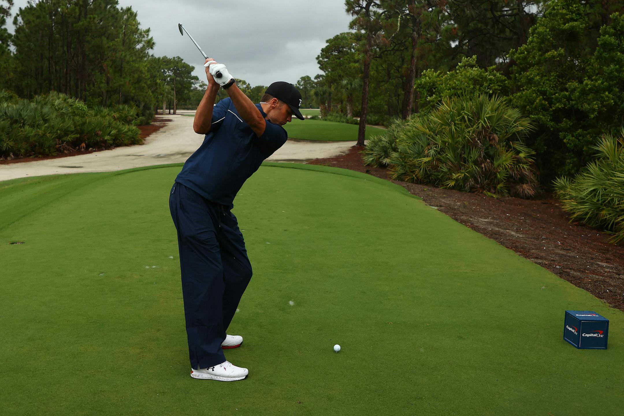 NFL quarterback Tom Brady of the Tampa Bay Buccaneers plays his shot from the 11th tee during The Match: Champions For Charity at Medalist Golf Club on Sunday, May 24, 2020 in Hobe Sound, Fla. (Mike Ehrmann/Getty Images for The Match/TNS)
