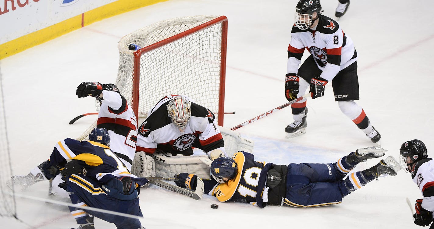 Eden Prairie goalie Shaun Durocher (1) was able to hold off a scoring attempt by Wayzata in the second period. ] (AARON LAVINSKY/STAR TRIBUNE) aaron.lavinsky@startribune.com Eden Prairie played Wayzata in the Class 2A boys' hockey championship game on Saturday, March 5, 2016 at Xcel Energy Center in St. Paul, Minn. ORG XMIT: MIN1603052247440090