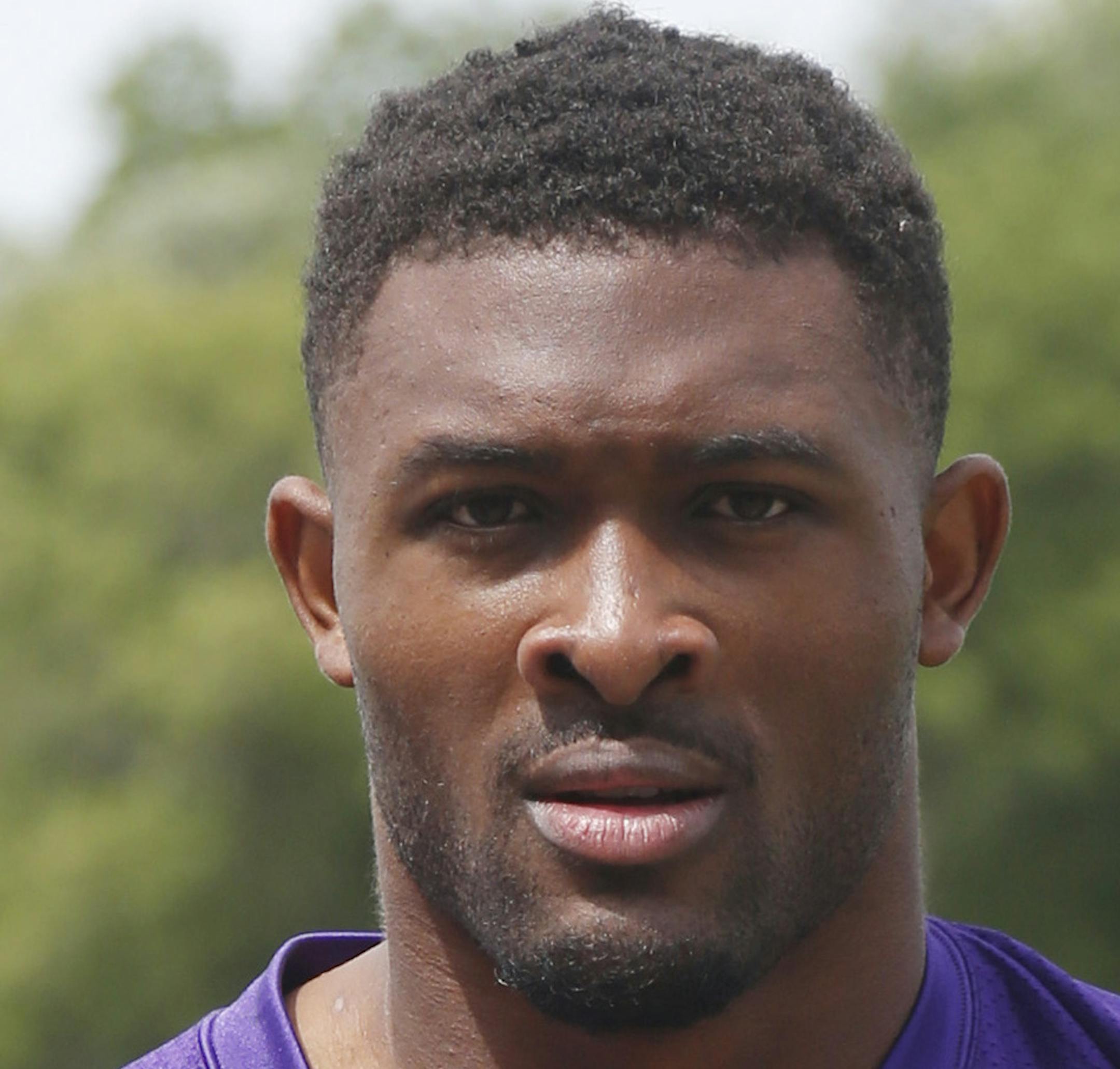 Minnesota Vikings defensive end Danielle Hunter leaves the field after practice at the NFL football team's training camp in Eagan, Minn., Thursday, June 14, 2018. (AP Photo/Jim Mone)