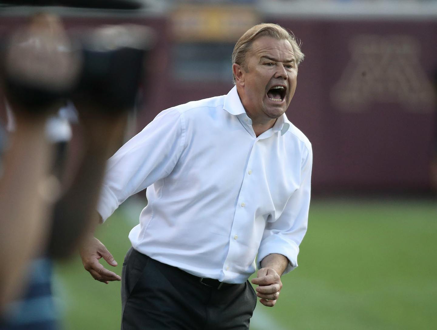 Minnesota United head coach Adrian Heath yelled instructions to his team during Tuesday's match at TCF Bank Stadium