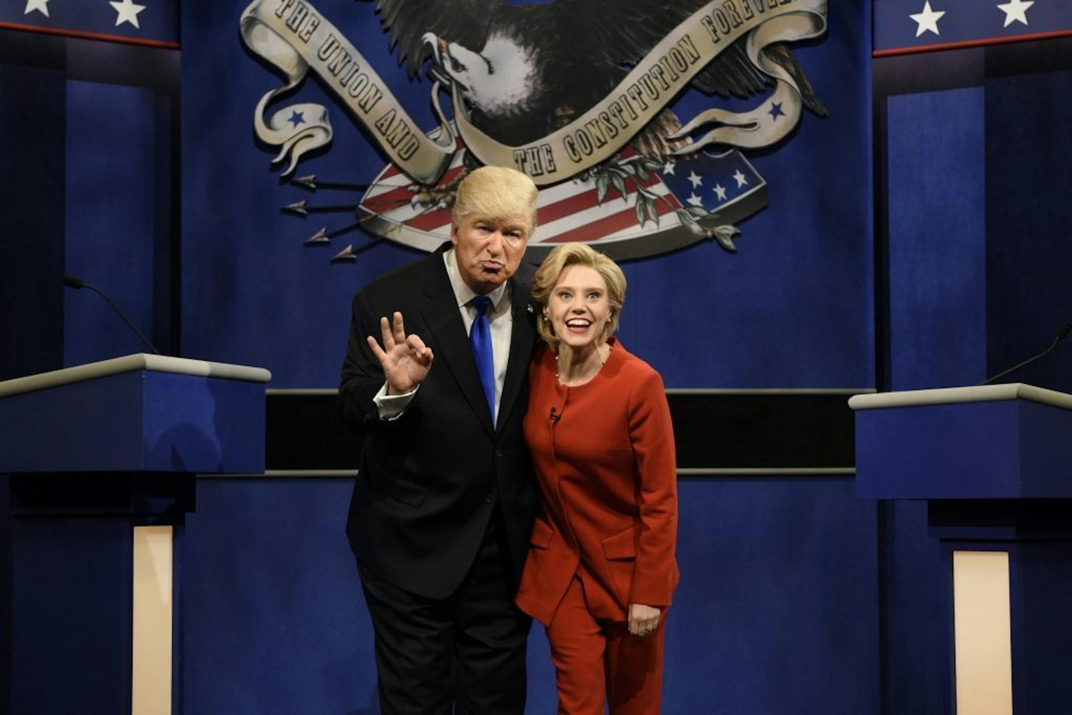 FILE - In a Saturday, Oct. 1, 2016 file photo provided by NBC, Alec Baldwin, left, as Republican presidential candidate, Donald Trump, and Kate McKinnon, as Democratic presidential candidate, Hillary Clinton, perform on the 42nd season of "Saturday Night Live," in New York.