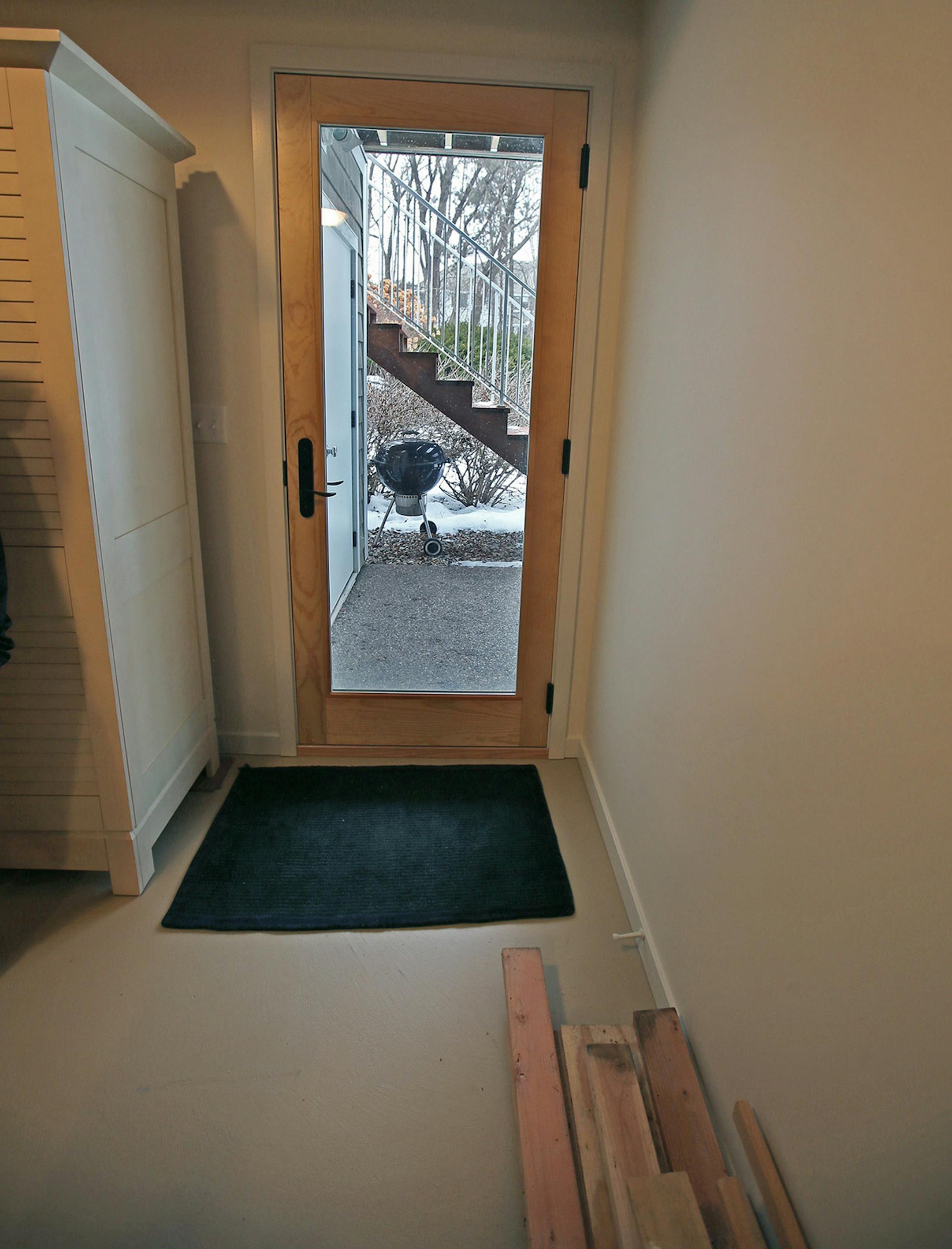 The storage room is accessible to the backyard.