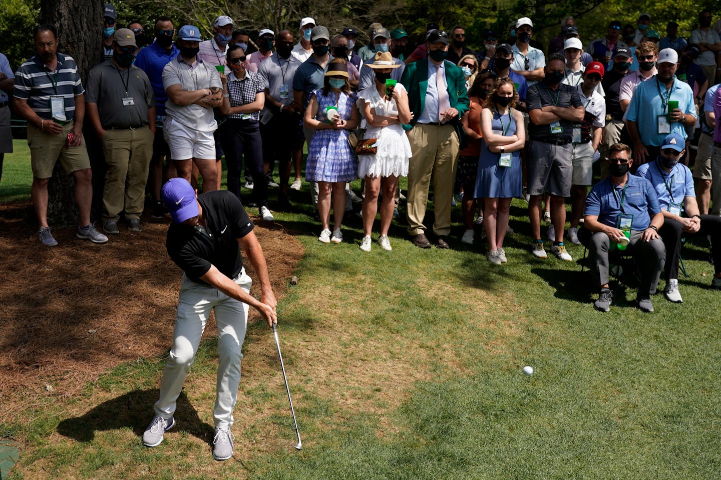 Rory McIlroy, of Northern Ireland hits out of the rough on the sixth hole during the first round of the Masters golf tournament on Thursday, April 8, 2021, in Augusta, Ga. (AP Photo/Charlie Riedel)