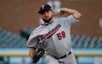 Minnesota Twins pitcher Gabriel Moya throws against the Detroit Tigers in the first inning of a baseball game in Detroit, Monday, Sept. 17, 2018. (AP 
