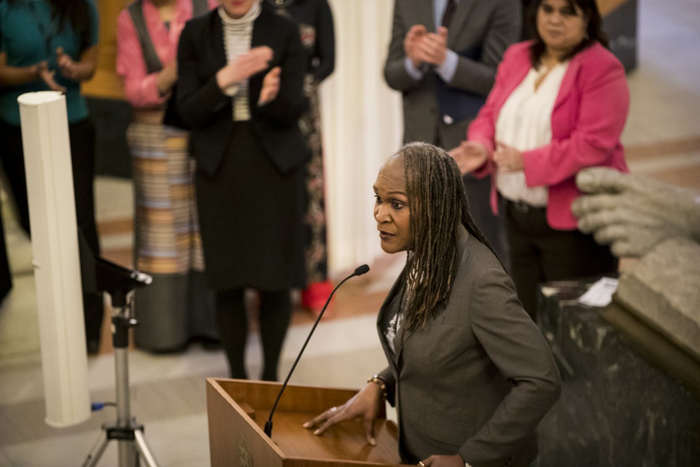 Council Member Andrea Jenkins spoke to people who attended the employee research group "29%" event in honor of International Women's Day in the rotunda at City Hall. Female city employees, which amount to 29%, also took a group photo in Minneapolis, Minn., on Thursday, March 8, 2018. ] RENEE JONES SCHNEIDER &#xa5; renee.jones@startribune.com