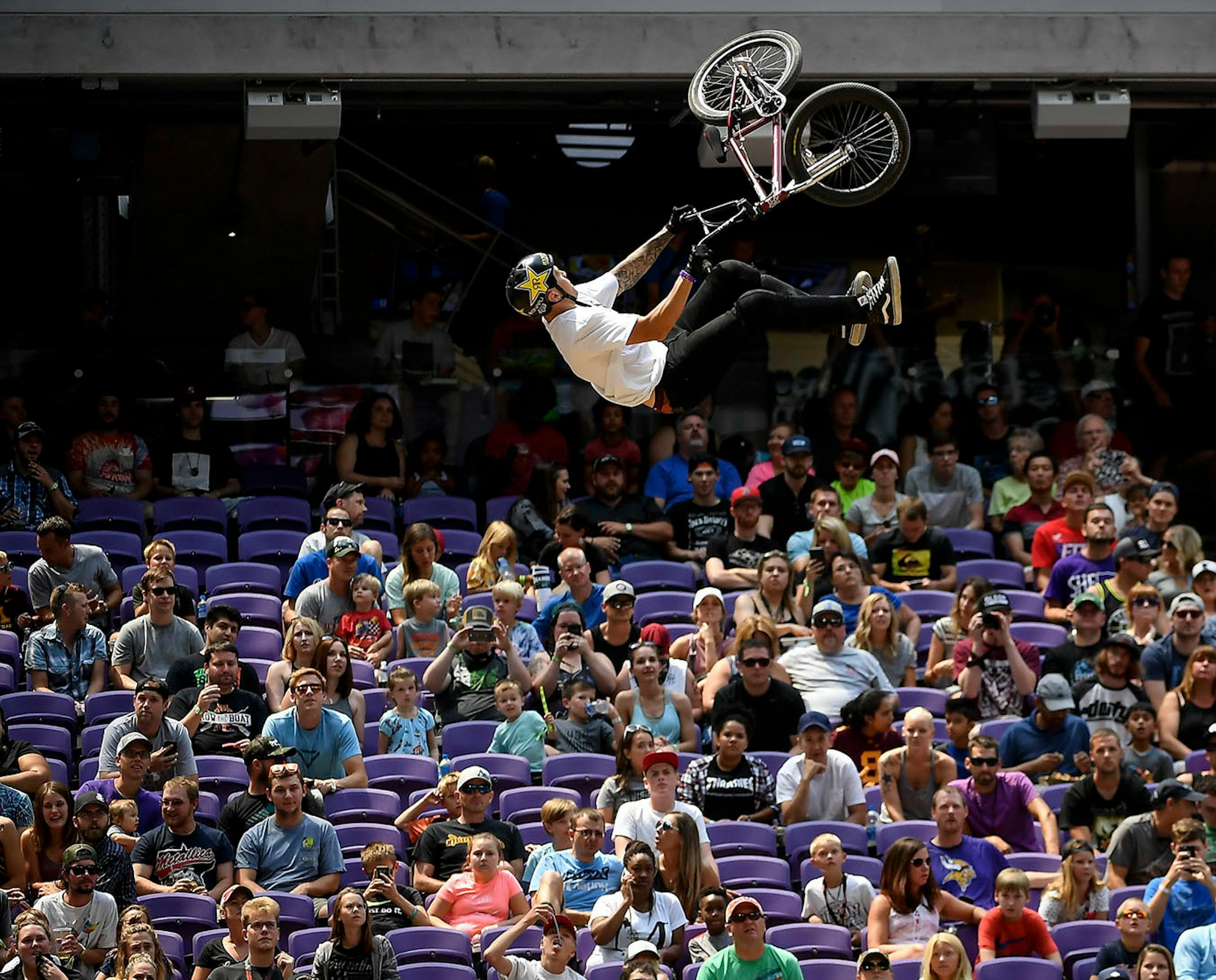 Fans watched as Brandon Loupos went airborne during his second run in the BMX dirt finals Sunday.