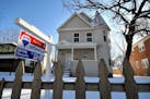 Home values in North Minneapolis have been depressed due to the high numbers of foreclosed homes on the market.