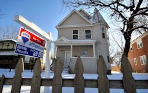 Home values in North Minneapolis have been depressed due to the high numbers of foreclosed homes on the market.