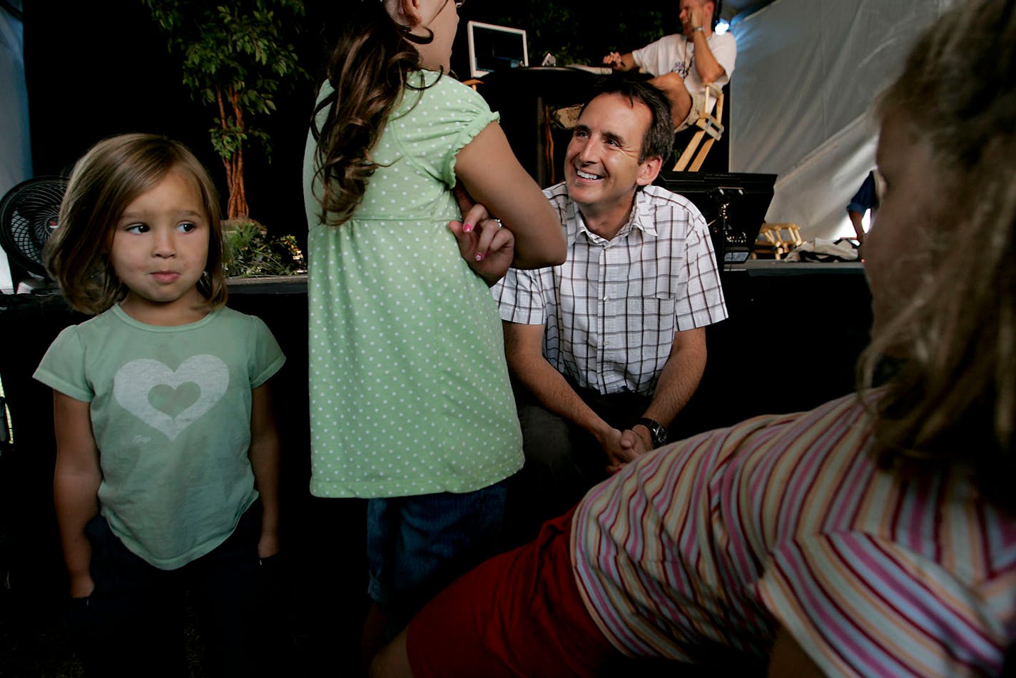 Alexa Sprinkel, 8, of Maple Grove talked with Tim Pawlenty at the State Fair Wednesday. Sisters Payton, 4, and Chloe, 6, were there, too.