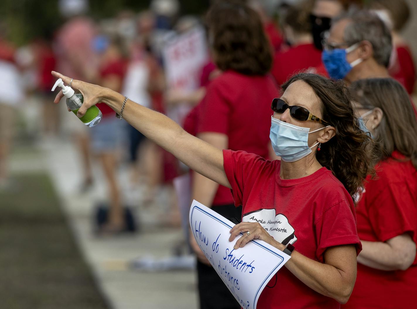 A rally was held ahead of Monday's school board meeting at Sandburg Education Center in Anoka. ] CARLOS GONZALEZ • cgonzalez@startribune.com – Anoka, MN – August 24, 2020, Sandburg Education Center, The members of Anoka-Hennepin Education Minnesota are calling for safety and equity to be at the core of the Anoka-Hennepin School District's Fall education plans. The union is also asking for more transparent communication around the plans now and moving forward. The union will host an in-person, ma