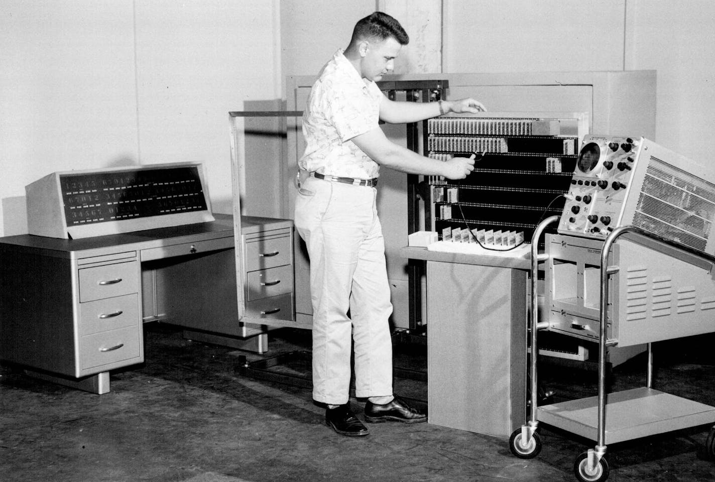 July 8, 1958 Carl Branger Checks Transistor Element It's one of 7,000 in new computer $600,000 contract for Control Data Corporation advanced large-scale electronic computer has been received from the United States navy bureau of ships, William C. Norris, president of the Minneapolis company, said today. July 7, 1958 Minneapolis Star Tribune ORG XMIT: MIN2017012922311235