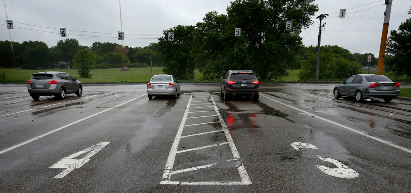 Cars lined up as drivers waited to take the test at the DMV in Eagan in May 2015.