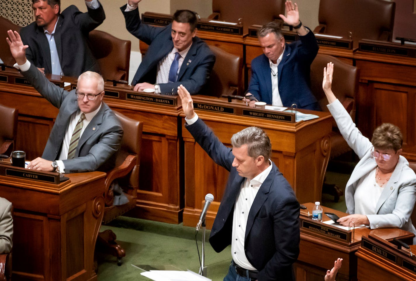 Making the point that this was the 21st time he called for a vote, House Minority Leader Kurt Daudt, R-Crown called again for a vote to end the state of emergency. Members raised their hands to request a roll call vote., Monday, June 14, 2021, in St. Paul, Minn. The Minnesota Legislature convenes for the first day of what's expected to be a prolonged special session to pass a two-year, $52 billion state budget. Leaders met all weekend in the lead up to special session Monday to try and finalize deals on a number of issues, including police reform and education funding. (Glen Stubbe/Star Tribune via AP)