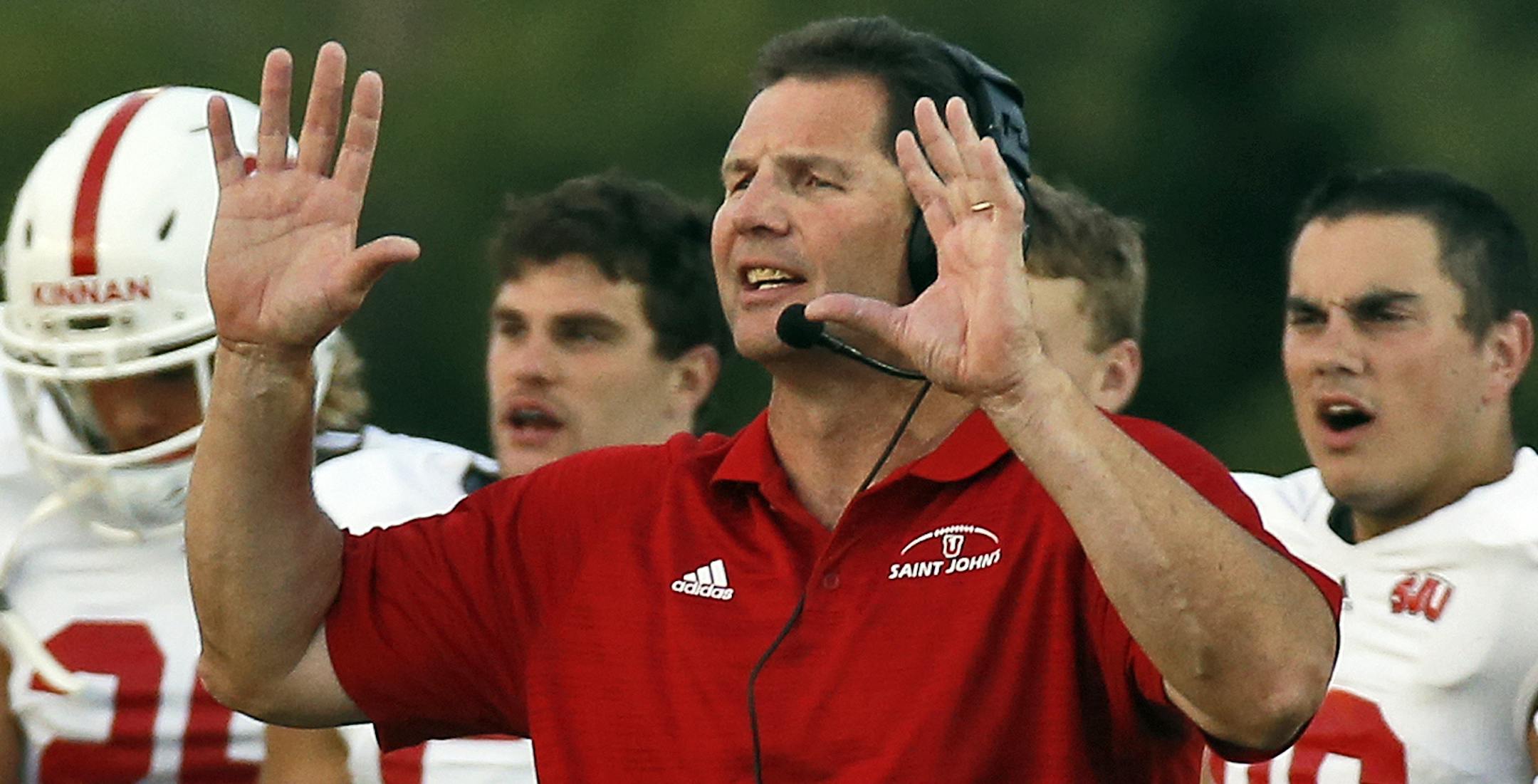 St. John's vs. UW River Falls football - first game under new St. John's head coach Gary Fasching. Fasching encouraged his players from the sideline. (MARLIN LEVISON/STARTRIBUNE(mlevison@startribune.com)