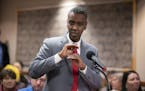 Abdi Warsame responded to questions asked by the Minneapolis Public Housing Authority board of commissioners shortly before they voted to hire him Wed