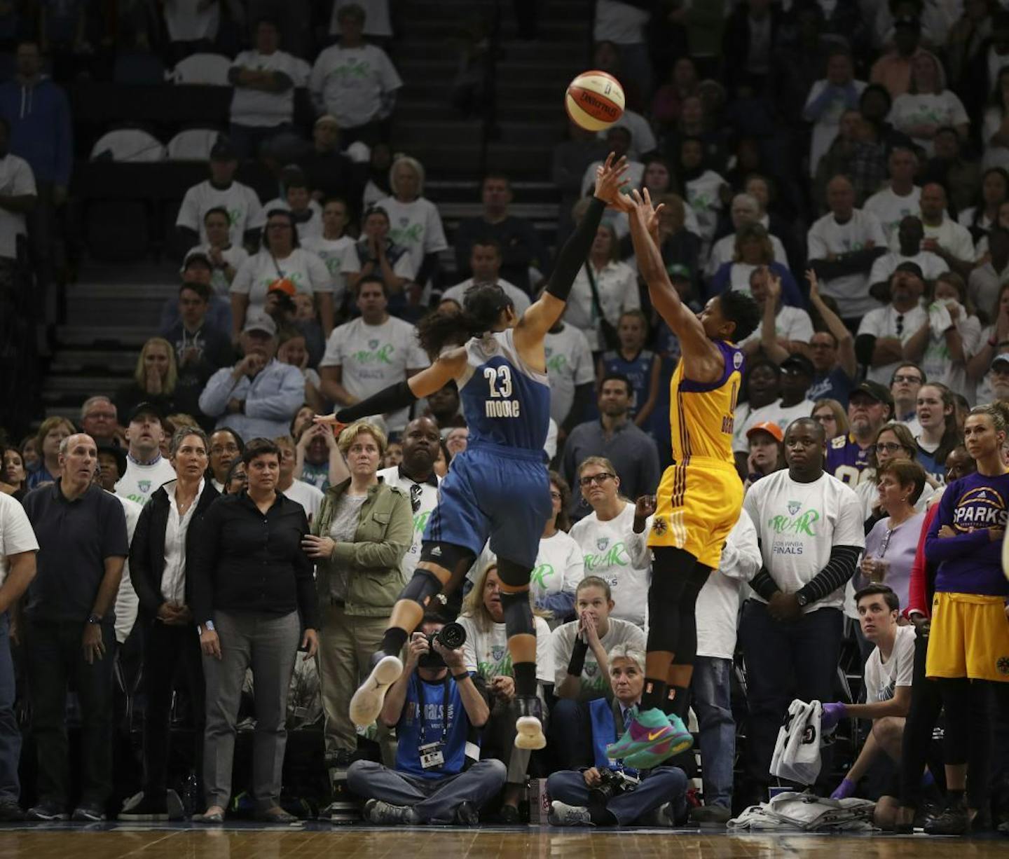 Los Angeles Sparks guard Alana Beard (0) released the game winner just before the buzzer while defended by Minnesota Lynx forward Maya Moore