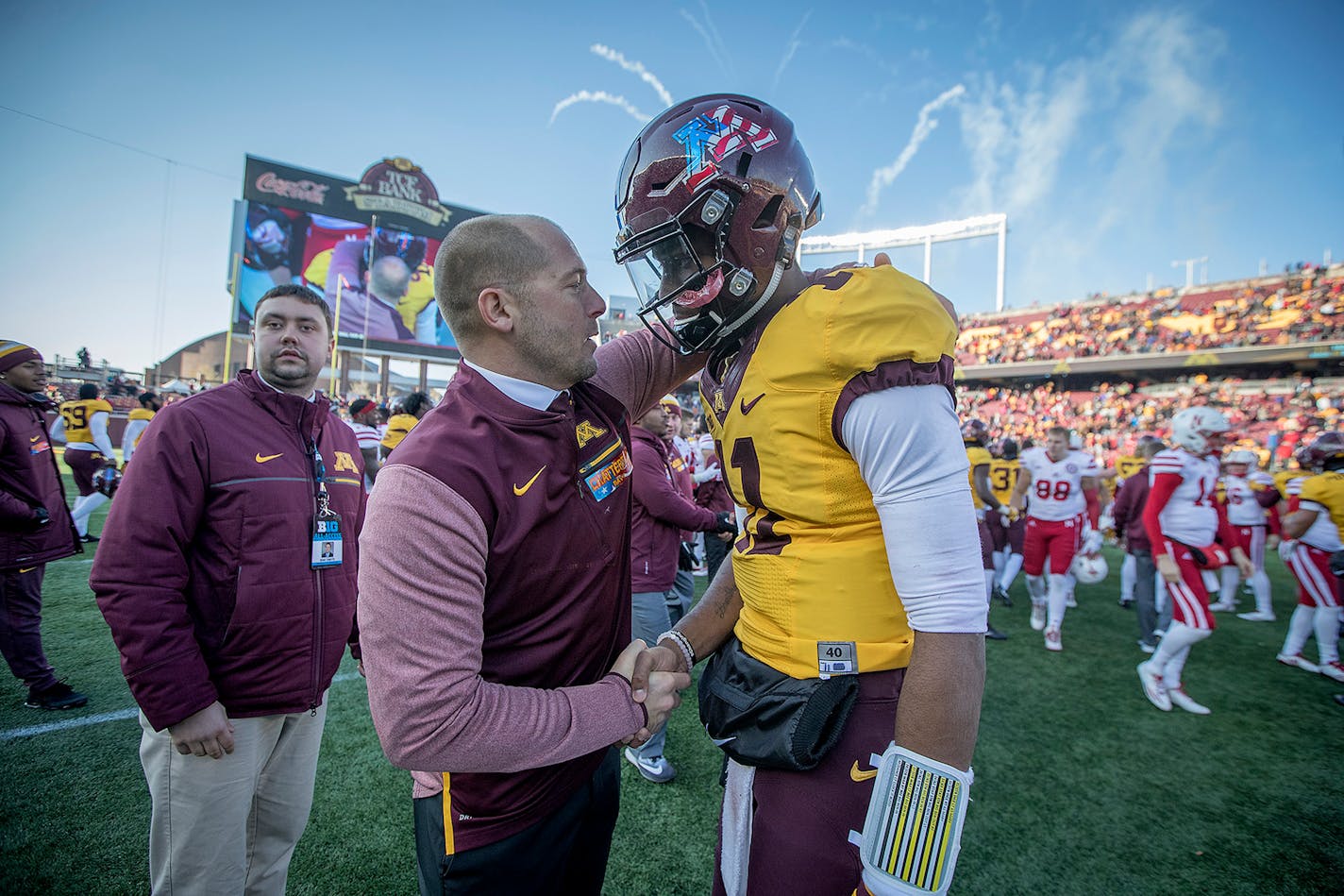 Minnesota coach P. J. Fleck congratulated quarterback Demry Croft for his performance after the Gophers defeated Nebraska 54-21 on Saturday