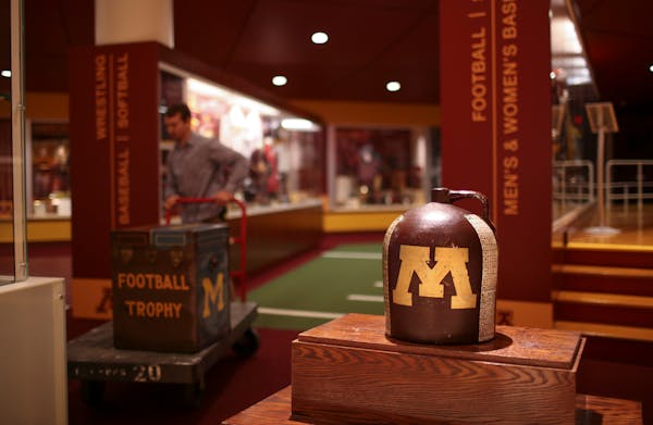 The Little Brown Jug was on a pedestal at TCF Bank Stadium in 2014.