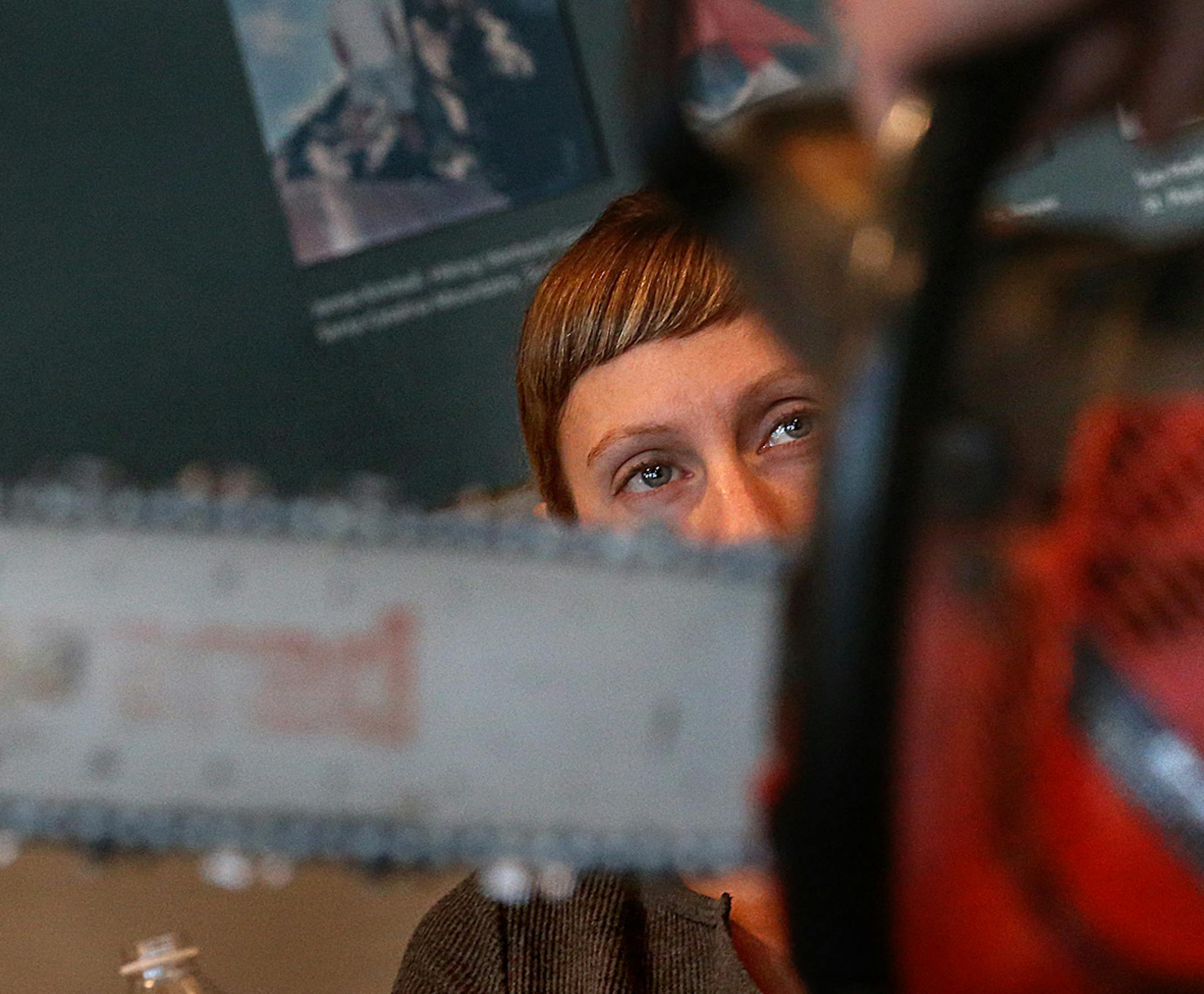 Jennifer Gehlhar of St. Paul listened to an instructor on the use of chain saws in buckthorn removal.