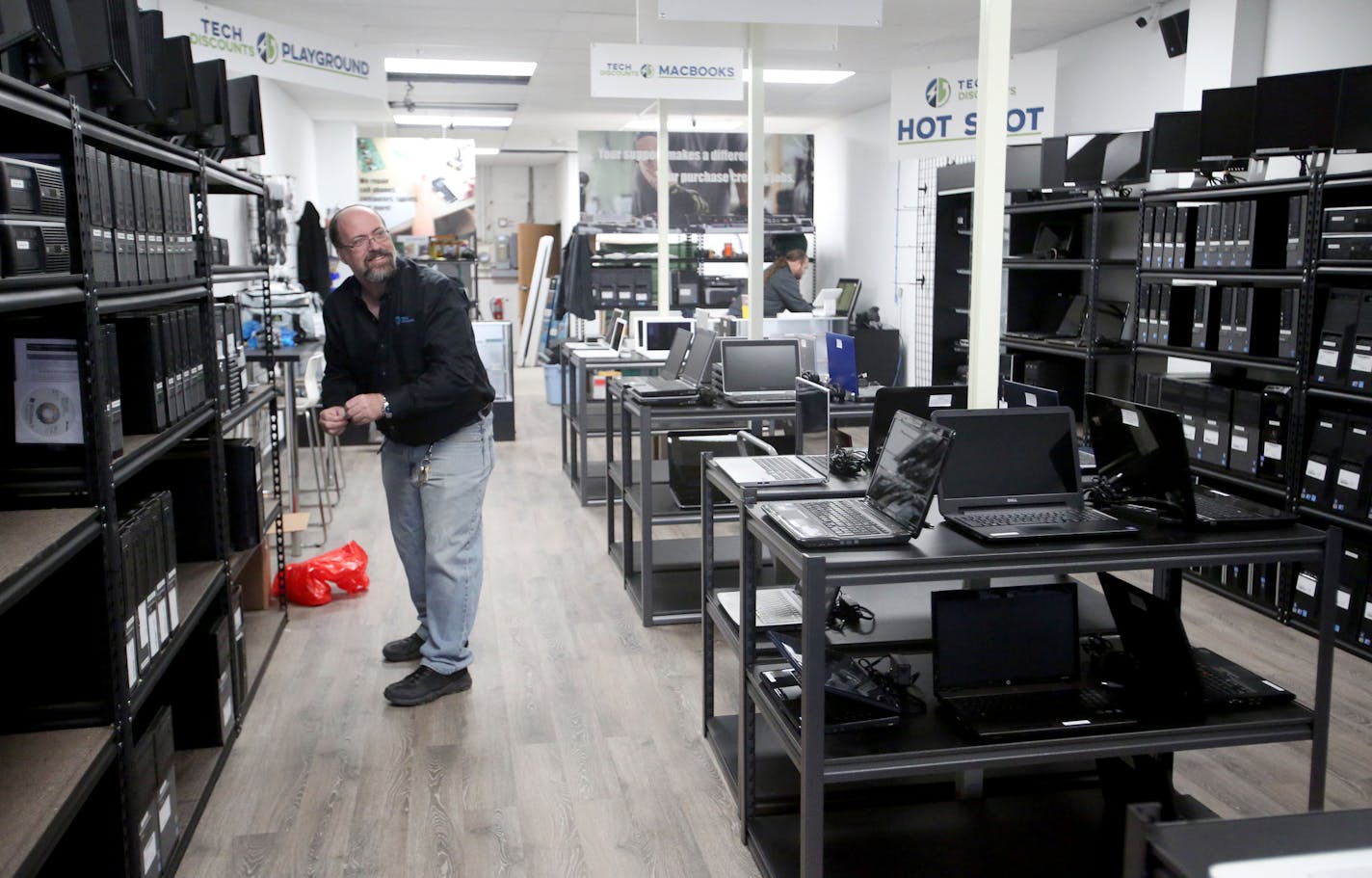 Tech Discounts, a new source for refurbished electronics offering 30-day money back guarantee and a six month replace or repair warranty was seen Friday, Nov. 18, 2016, in Bloomington, MN, on the eve of the Saturday grand opening Saturday. Here, store manager Patrick Coffelt, prices computers before the grand opening.] (DAVID JOLES/STARTRIBUNE)djoles@startribune.com Tech Dump, a St. Paul-based nonprofit that creates jobs through electronics recycling, is opening its first retail location in Bloo